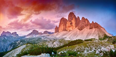 Amazing view of The Three Peaks of Lavaredo (Tre Cime di Lavaredo) at sunset. Trentino Alto Adidge, Dolomites mountains, South Tyrol, Italy, Europe.の写真素材