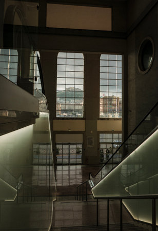 View of a castle through a window in a cityの写真素材