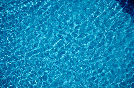 Blue water with light reflections.