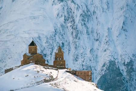 Gergeti Trinity Church in Winter, Kazbegi  (Stepantsminda), Georgiaの写真素材