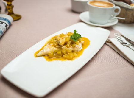 Breakfast of pancakes with cottage cheese and honeyの写真素材