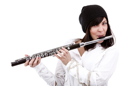 Image of a girl playing on fluteの写真素材