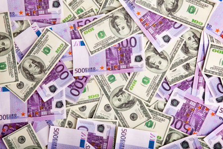 Image pile of banknotes - dollars and euros