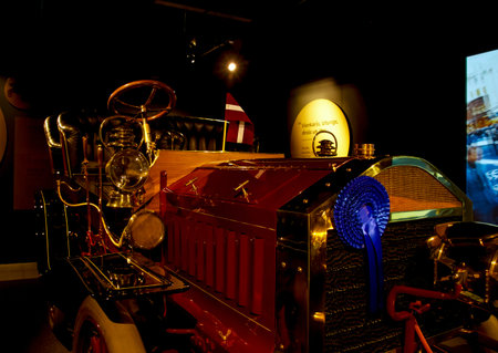 Beautiful hundred years old retro car as evidence of the development of auto industry and reflection...