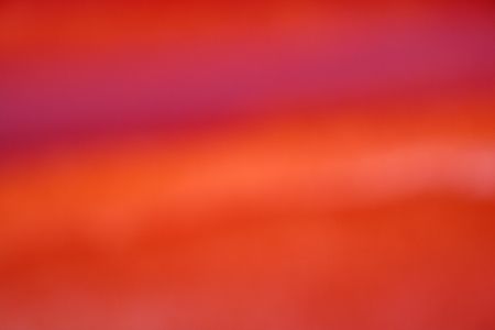 Abstract out of focus image of red paper streamers. Great as a background.の写真素材