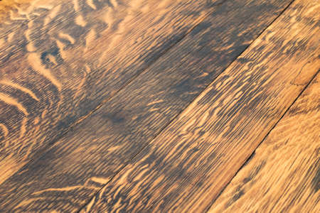 restored oak barrel fragment with diagonal runing boards close up shot as backgroundの写真素材