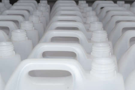 Many plastic canisters in chemical factory prepared for production lineの写真素材