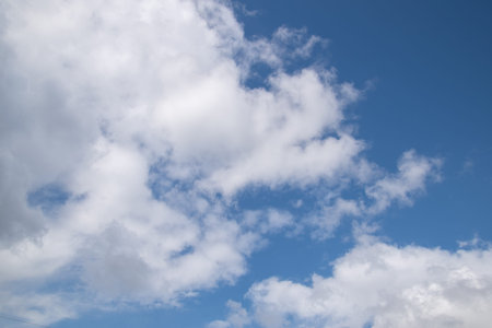White and gray clouds in the blue sky.