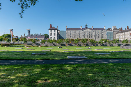 Summer day in Dublin city,people enjoying the sun in Croppies Acre Memorial Park