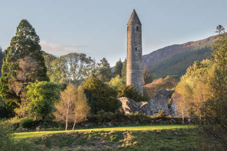 Glendalough Round tower, built of mica-slate interspersed with granite .の写真素材