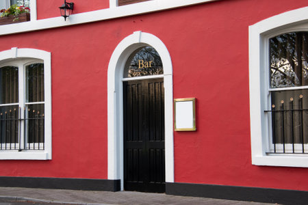 Entrance into one of Irish pubs with closed door.の写真素材