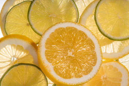 Fresh juicy citrus fruits on white background, flat lay.の写真素材