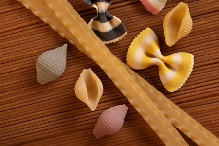 Various raw pasta and spagetti Traditional Italian cuisine. Top view.