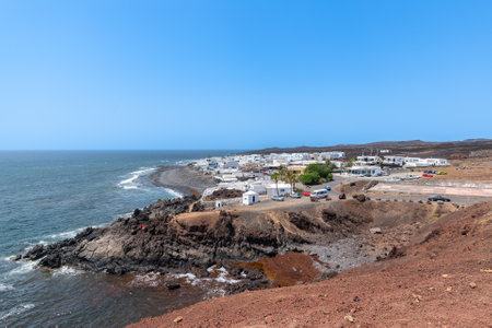 View over El Golfo village from Cuevas de Garrido viewieng point.の写真素材