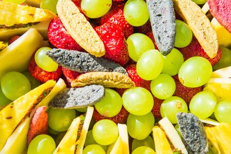 Colorful fruit and cheese mixの写真素材