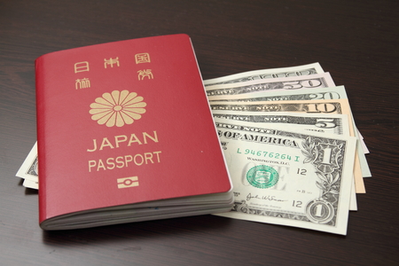 Japanese passport and US dollarの写真素材