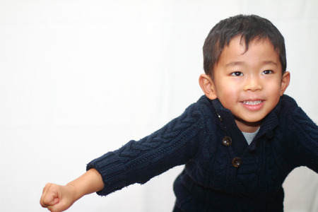 Smiling Japanese boyの写真素材