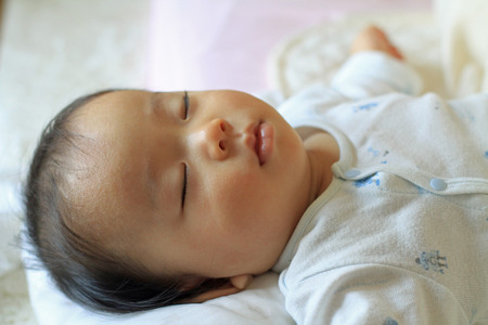 Sleeping baby (Japanese boy)の写真素材