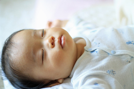 Sleeping baby (Japanese boy)の写真素材