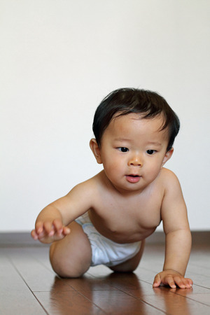 Crawling baby (Japanese boy)の写真素材