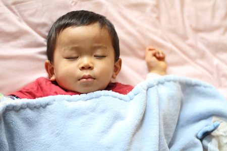 Sleeping boy (Japanese 1 year old)の写真素材