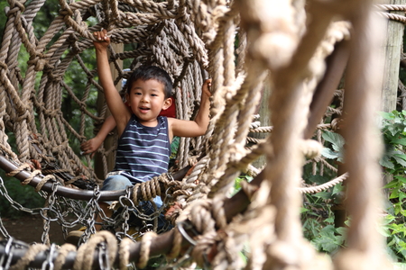 Japanese boy in athletic fieldの写真素材
