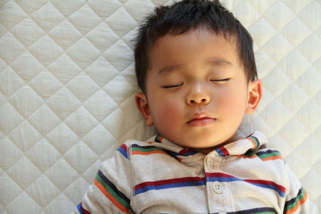 Sleeping Japanese boy (2 years old)の写真素材