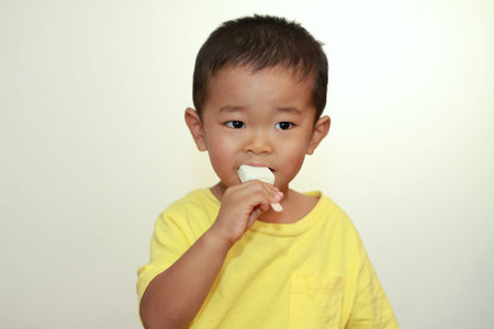 Japanese boy eating ice cream (3 years old)