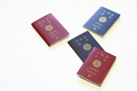 Japanese passports (red and blue)の写真素材
