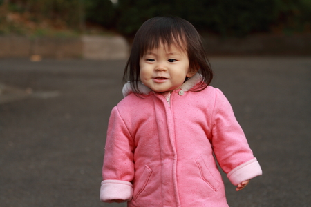 Japanese toddling girl (1 year old)の写真素材