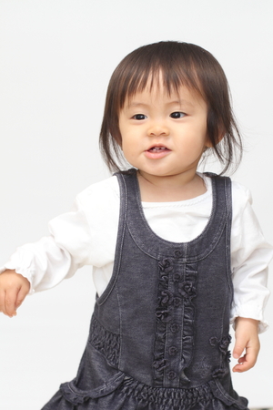 Japanese toddling girl (1 year old)の写真素材