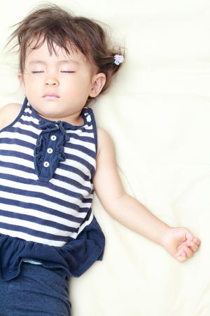 Sleeping Japanese girl (1 year old)の写真素材
