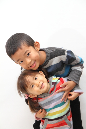 Japanese brother and sister (7 years old boy and 2 years old girl)の写真素材