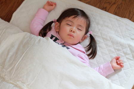 sleeping Japanese girl (2 years old)の写真素材