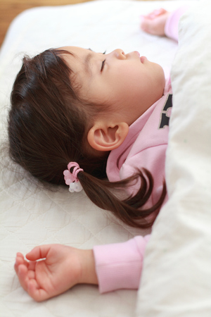 sleeping Japanese girl (2 years old)の写真素材