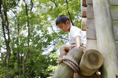 Japanese boy playing with ropewalking (second grade at elementary school)の写真素材