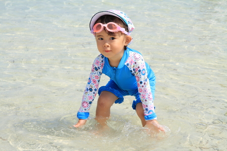 Japanese girl on the beach (2 years old)の写真素材