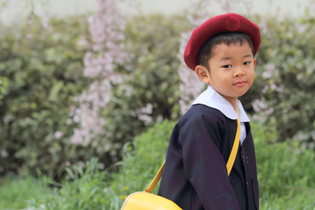 Japanese boy in kindergarten uniform (3 years old)の写真素材