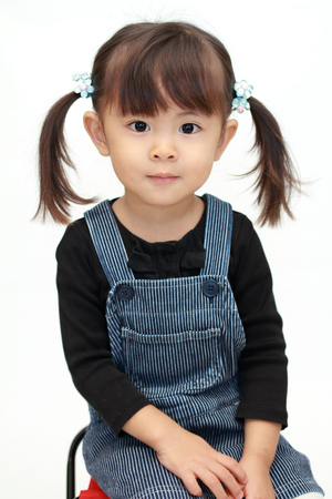 smiling Japanese girl (3 years old) (white back)の写真素材