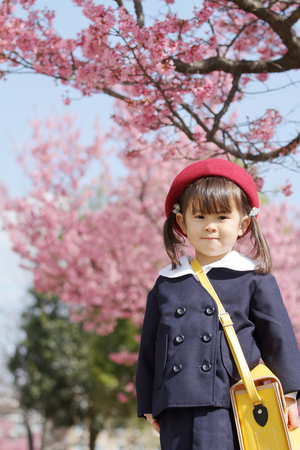 Japanese girl in kindergarten uniform (3 years old)の写真素材