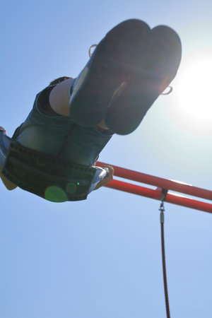 Japanese boy on the swing (third grade at elementary school)