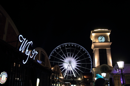 observation wheel and clock tower in Asiatique, Bangkok, Thailand (night scene)のeditorial素材