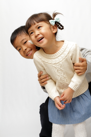 Japanese brother and sister (9 years old boy and 4 years old girl)の写真素材