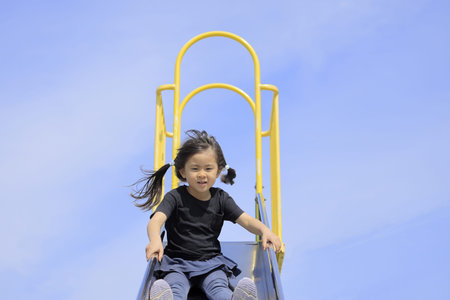 Japanese girl on the slide (5 years old)