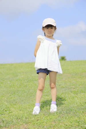Japanese girl under the blue sky (5 years old)の写真素材