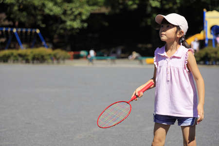 Japanese student girl playing badminton (6 years old)の写真素材