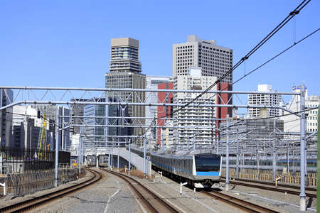 Running train in Takanawa Gateway, Tokyo, Japan (Keihin Tohoku line)のeditorial素材