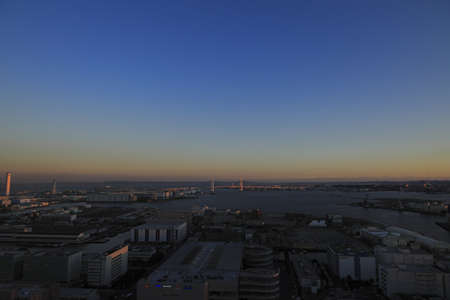 Yokohama bay bridge in Kanagawa, Japan (view from Shinkoyasu) (evening scene)のeditorial素材