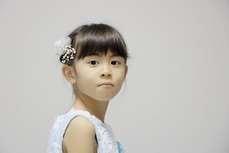 Japanese girl in a dress (7 years old)の写真素材