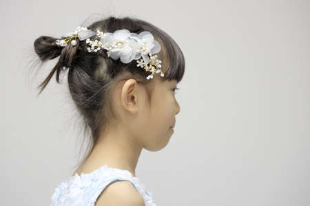 Japanese girl in a dress (profile) (7 years old)の写真素材